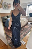 This fit true to size and is really stunning for the price. Obviously needs a hem but I'm 5'3 so that's expected. - Madalyn C.