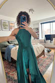 I sized up based on reviews and it was huge. Also didn't love the fabric, felt cheap. I would imagine this wrinkles really easily while wearing. Color was nice though. - Madalyn C.