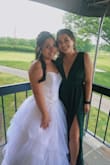 I ordered this in the dark green and loved the color in person! It also fit perfectly! I like the elastic strips included in the bust part of the dress to ensure there is not any slippage! Also received many compliments throughout the night! - Tori R.