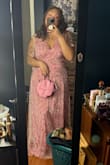 This is an absolute gorgeous dress, but be aware it's long. I was stepping all over myself,  but I'll just have to get it hemmed. I ended up ordering this in a 2X first because I had another dress that fit in a 2X and this one was HUGE on me. So I got the XL because I was planning on losing a little weight and it was way too tight. The 1X ended up being just right. The way the fabric billows out looks so magical. The silhouette is so flattering and if you're not a fan of your arms you also get a little coverage. Highly recommend. My new favorite dress. - Briana M.