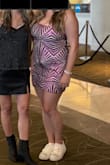 The dress is high quality and relatively true to size. The sequins do rub against your arms a bit, but overall I liked it! - Kelsey B.