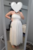 After looking at 4 Lulus dresses, I kept this one for my bridal shower. Not too fancy but not too casual. I sewed a ruching line down the middle to keep the ruffles in place and make the neckline a little more interesting. Very comfortable and moderately flattering. My only complaint is that the seam lines in the bust are quite obvious, it looks like the straps go down to the waist under the tulle - Julia C.