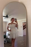 LOVED THIS. Purchased this for engagement photos! It came with a few stains on the inside (blue ones) and a spot on the top, but with photoshop I can hide it, I'm sure. I wish I sized down because it's on the bigger side, I'm typically a medium, but def could've gotten away with a small. - Alyssa F.