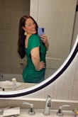 This dress was AMAZING.. for me anyway. Size down if you're very slender. I'm short and very curvy so I have a hard time with more form fitting dresses but after reading reviews I went for my normal size large and this dress was perfection on me. It was cut lower than I anticipated so had to tape a couple places and I couldn't wear a bra because then it pulled weird but an XL def would've been too big. Unless you have a super long torso or zero butt the zipper comes down onto your butt and looked a little lumpy but not terrible. Otherwise the material was gorgeous and I got soooo many compliments. It was almost ankle length on me not midi bc of my height but I actually loved the length. I would buy this in every color. - Valerie
