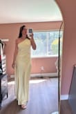 I was very worried about having to find a yellow satin dress for a wedding, but this one is beautiful and very comfortable. I can wear a strapless bra with it and it drapes in a flattering way across my stomach. Highly recommended it. It does seem to run a bit large, I tried a M and an L and the large was waaayy too big and the medium fits well but is still slightly loose. - Sophia C.