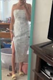 Absolutely love the dress, and it fits perfectly and is on point for graduation reception, but the zipper will not go up once it hits the cross seam. Even when the dress isn't on, the zipper gets stuck and doesn't go up smoothly. Otherwise, it would be perfect and 5 stars. - Wendy G.