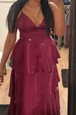 I loved the color and quality. Other comments are right about the boob area being a little too big on the side, but it works for me. I'm gonna keep it. For reference, I am 34 in bra and a size Medium. - Gina M.