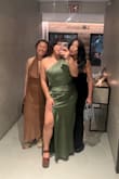 This dress was beautiful and I got endless compliments as a wedding guest. The color and shine of the material was stunning. I wore this without a bra cause it was pretty snug on my bust.

While dancing I began to sweat and you immediately could see it on my back through the dress - that was the only draw back. - Xandra S.