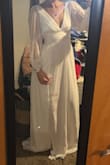 I absolutely love this dress! The sleeves are perfect. I ended up returning it since the length of the dress was too long for me and would need hemmed. Unfortunately, I didn't have the time to take in to get hemmed before my engagement photos. The photos in the dress would've been beautiful. - Brianna P.