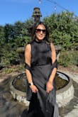 The dress fit like a glove. Silky soft and was used for an all black wedding - Betsy V.