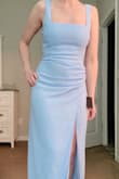 The slit on the dress does not stop, I was worried about exposure so I returned it. Otherwise, I liked the color and style. - Katelyn E.
