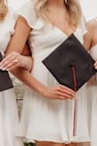 This dress is so beautiful and flattering! Ordered for my college grad photos, and it looks so amazing. I ordered a size XS and I have longer legs, but it still looked so cute. So flowy and the short sleeves look so nice - Allyson S.