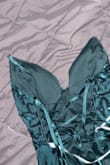 Came with strap not connected to the dress. My dance is in 2 weeks leaving me with no dress and no time to order a new one. - Graciela F.
