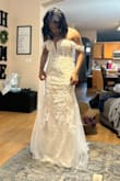 I bought this dress for my wedding in June, so I still have to get it altered, but I'm so glad that it fits as well as it does! I'm between a size 6 and 8, but I bought a size 6 and it fits kind of tight, but I feel like an 8 may have needed more alterations. Either way, too cute!! - Erin P.