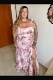 I am in love with the dress. Fits like a glove, true to size, no need to wear a bra for the big boobied ladies. A must buy - Shiny M.