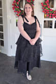 The dress is super cute on! I usually don't wear dresses that have such a low chest area, but with the tie sleeves, it really held up securely. The fit was great. I loved the structure of the top. I'm not really busty enough to really fill the cups, but now I know that I'll need to tape everything in place the next time I wear it. The only issue I had with this dress is that the black fabric kind of pilled off and stained my armpits a little bit? Maybe it was just the deodorant I was wearing, but that was the only "issue". - Kaitlyn M.