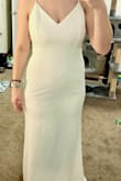 Very pretty and good stretch. The hips were the right size with the waist a bit loose on me, but could be altered. Walking around the under slip felt like it got caught and that was slightly annoying. I ultimately went with a more structured dress. - Beverly M.