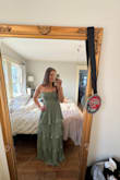 Love this dress. I bought this and one other dress to wear as a guest for a wedding, and this is the one that I was a little unsure of because it's a style that I wouldn't normally pick. But when I tried it on, I LOVED IT. So cute and flowy, and I can't wait to hit the dance floor with it. The fit is also great. I basically have no chest, so I was a little worried it might not stay up super well, but there is a rubbery material at the top that helps keep the dress from slipping. - Siobhan B.