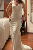 I ordered a few dresses from Lulus. All were excellent quality, but this one was the one I kept. Exactly what I wanted for my big day. Nice and simple yet classy. The train and buttons up the back were perfect details. - ERICA A.