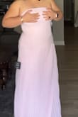 Size suggested was XL, which was very big on the bust and all over loose, sized down to L and would barely zip. A little sheer on the top (pasties are necessary) - Maija P.