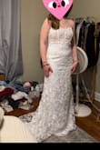 Absolutely STUNNING, I LOVE this dress!!! The material is very nice. It came in very quick and was true to size! It's stretchy and very soft. I'm in love with it! - Haylei B.