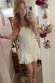 This dress is super cute and fits great! The material is very nice. Not see through at all. Fits good on people with a smaller bust size. - Keira M.