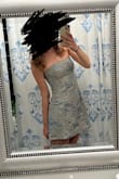 Cute dress! Fits well and good quality. Has grippy silicone band to help stay up - Clara T.