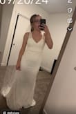 Up until a couple months before my wedding, this was going to be my dress! It's super simple and adorable! But I just wasn't in love with it and just knew it wasn't my dress! Almost everything about it is perfect; the length was a little short on me and you could see my feet when I had my heels on, so keep that in mind since I'm not very tall! - Paige H.