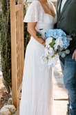I got so many compliments on this dress for my reception. It was the perfect length because I'm short. I didn't have to do any alterations. It's dressy enough to be a wedding dress if that's what you want to use it for! - Jalyn W.