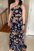 This dress fit like a glove. I did have to have it hemmed because of the length, but otherwise loved everything about the dress. - Caitlin F.