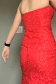 Other reviews are right, the top of the dress is a bit tight when putting on but if you get someone to help you, you'll be fine - super comfy once on. Doesn't move around or anything, which is great for being strapless!! - Bianca D.