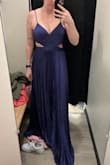 This dress is amazing and perfect for tall girls. I'm 5'11. I bought the large but had to return it because it was very slightly too large around the waist, but the top fit correctly. It could be taken in and fit perfectly (brought it to a tailor and he said it was possible), but I didn't have time before my event. I could've still worn it, but I had another option available. - Allison C.