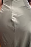 The dress itself was beautiful and fit well. The color is more muted than pictures but it is nice. I would have kept it if the sewing had been better. The back portion (butt area) had a bulge at the seams. Someone else commented on the same problem and I should have heeded that review. I returned it. - Ana P.