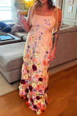 Such a fun, interactive dress with 3D like flowers. I received so many compliments on it, and will actually be wearing it a second time in May! I can't wait. - Kaitlyn K.