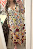 I wore this for my Bridal shower, its theme was love is in bloom and it was absolutely perfect. The pops of color in the flowers really added to the beauty of this dress. - Kayla W.