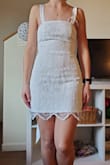 I ordered a size too small, so I would recommend using their sizing chart more closely (I'm 5'5" and 135 lbs with wider hips and a smaller bust). The dress is a bit short in general. The detailing is SOOOO pretty. The straps are also very cute; you just might need help tying them on if you want a cute bow. The zipper is also a little tight and stiff, so I would recommend help with that too. I loved this dress so much, but ordered the wrong size (xs when I needed a small) and ended up going with another dress from Lulu's for my graduation dress. - Evangeline G.