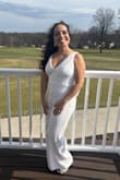 I fell in love with this jumpsuit when I found it on the website and it did not disappoint when I wore it for my shower. The amount of compliments that I received, along with how fun and cute I felt that day, was everything I could've dreamed of and more. I will be honest and say I had to get it altered because of the length (I am 4'10 so most of my clothes have to be hemmed) and the straps were taken in just a bit for more support in the chest to avoid any slips, but otherwise it fit perfectly. The one thing I will share, and this is more my body type than anything, was that every time I went to hug someone, one snap on either side of the bow would let go, but two seconds later we were back in business and good to go. Also, because of my thighs, sometimes when I would walk, the sequins would catch a little bit, but again, it was a second of my life, and I could care less.
I truly felt like this outfit was everything - it was so fun and sparkly and the bow was just the cherry on top. I would Highly Recommend! - Brittany C.