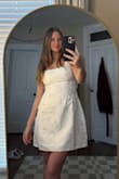 I'm so glad I took a chance on this dress- I was a little worried about the bow in the back, but it ended up being a perfect addition and can't be seen under my grad robe. This is the perfect dress. I love the neckline and that it covers my backside completely. Beautiful details and pattern as well. Definitely a must buy!! - Evie W.