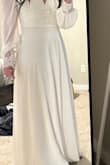 Got this for an engagement photo shoot. I did get it altered since I am short, and I didn't want as much cleavage. I think it turned out great. The dress does not feel cheap at all; there are tons of layers in the skirt, and the details are nice. - Crystal O.