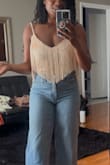 This top is so much fun! It looks nice, pretty well made, only thing I found to be cheap about it is the zipper quality, however, it does match the top, and it's pretty much invisible. I have no idea where I'm gonna wear it, but I can't wait for the moment! It's going to be a party vibes staple - Latina M.