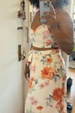 The print on this outfit is beautiful! BUT, with 34D breasts, I needed a larger size. My breasts were quite snug and looked a little flat. Also, I normally wear a 29" in bottoms, and this was tighter on the waist. I would recommend sizing up if you have hips and larger breasts. This is a very long skirt also, so I will have to wear heels with it. Sadly, I could not return it because I was outside of the return window - busy medical student just trying to make it through school and have a little fun every now and then. :/ - Jessica S.