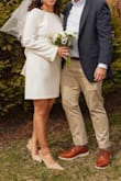 Perfect dress for a courthouse wedding. Simple and elegant. I love the bow detail at the back! But it runs a little large and the sleeves are too long. I had to alter it with a tailor. - Johanna O.