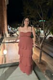 I absolutely loved this dress. The color was perfect and the strapless neckline was stunning. I got so many compliments throughout my night and I will definitely be wearing it again. I had to pull it up a few times, but it was not noticeable and didn't affect my night. There is a lining that helps the dress stay up! I'm 5'7" and the XL was a little long, but nothing crazy. Only thing I would say is be careful with the zipper! On the first dress I had, it was broken. It overall seems fragile. The Lulu's team was great and took such great care of me. Will be buying in more colors when I get the chance - Payton F.
