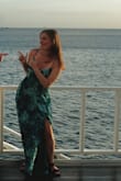 I wore this dress to a destination wedding in the Caribbean, and it was perfect. I'm 5'4 and while it was a little long, it was fine without being hemmed. It was also a little hard to zip the top inch of the zipper bc the upper rib section was a little tight on me. But overall, I thought it was a beautiful pattern and color and hope I have an occasion to wear it again. - Katarina K.