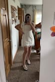 This dress fit so nice and looks very well when styled appropriately! I purchased this for my graduation ceremony and I'm absolutely in love with it! It isn't too short so it goes past my fingertips when I'm relaxed - Amelia A.