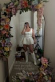 Absolutely love it! I bought it for my wedding reception. I did get the straps altered to fit me a little better but I love the look and I can't wait to wear it on my wedding evening! - Samantha S.