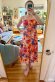 I love this colorful dress! I ordered my normal size medium and it fits me well. The open back is also perfect AND still covers up a normal strapless bra! Fabric is very lightweight and flowy and the dress is fully lined. - Summer V.