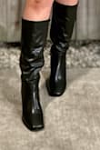 I bought these for my birthday fit! Perfect height, enough calf space, and comfortable. Lasted all night and high quality. 10/10 recommend - Shelby P.