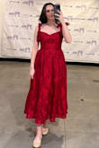 This dress is gorgeous, the color is as shown. I got so many compliments on the deep red color, and it wasn't too long on me, I'm 5'5". I ordered a size L, which was just slightly too big, but I wanted room for my performance to take big breaths. It's nice cause you can adjust the straps and tie them to the length you want. Overall great quality! - Katherine S.