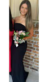 This beautiful black dress arrived quickly as ordered and besides being long for my daughter, it fit like a glove! - Gabrielle B.